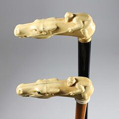 Two Vintage Composition Horse and Jockey Canes