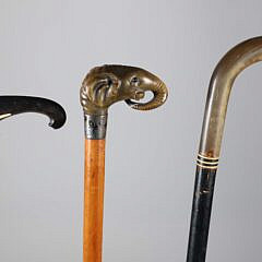 Three Vintage Animal Grip Canes on Wood Shafts