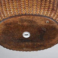 Fine Open Oval Swing Handle Nantucket Basket with Carved Wood Ears, mid 19th Century