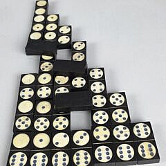 Complete Set of Sailor Made Antique Whale Bone and Ebony Dominoes, 19th century