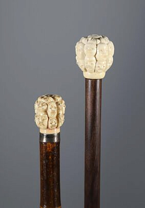 Two Japanese "Thousand Face" Walking Sticks, 19th Century