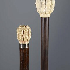 Two Japanese “Thousand Face” Walking Sticks, 19th Century