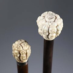 Two Japanese “Thousand Face” Walking Sticks, 19th Century