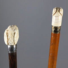 Two Carved Dog’s Head Grip Canes, 19th Century