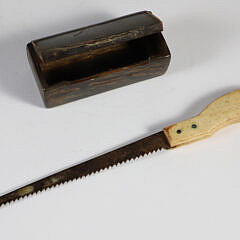 Buffalo Horn Snuff Box and a Whale Bone Handle Saw, 19th Century