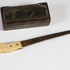 Buffalo Horn Snuff Box and a Whale Bone Handle Saw, 19th Century