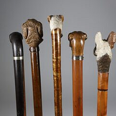 Collection of Five Carved Wood Various Dog’s Heads Walking Sticks