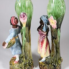 Pair of Antique Majolica Blackamoor Figural Floral Vases of Boy and Girl
