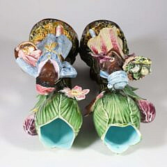 Pair of Antique Majolica Blackamoor Figural Floral Vases of Boy and Girl