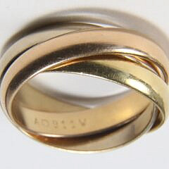 Vintage “Les Must de Cartier” 18k Gold Trinity Ring