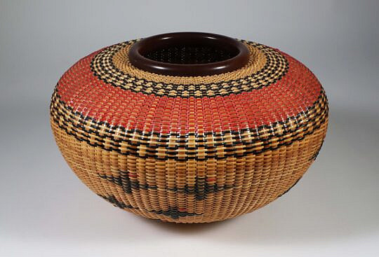 Joan Brink Polychrome Woven "Navajo" Style Basket with Mahogany Rim and Base