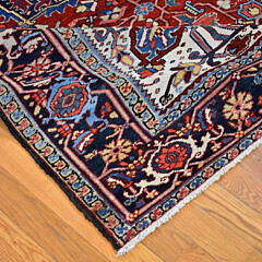 Red and Blue Accents Antique Persian Heriz Hand Knotted Wool Oriental Carpet, circa 1930s