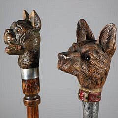 Two large Carved Wood Dog Head Walking Sticks, 19th Century
