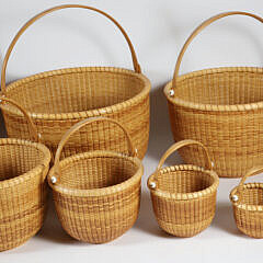 Bill and Judy Sayle Nest of Eight Round Open Swing Handle Nantucket Baskets circa 1994