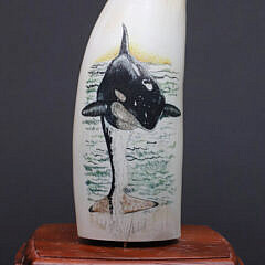Scrimshaw and Polychromed Whale Tooth Depicting a Breeching Whale