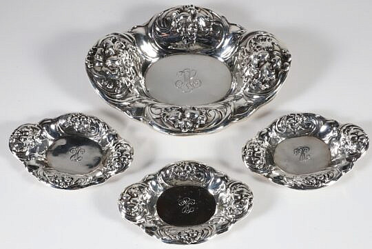 Four Sterling Silver Repousse Nut Dishes