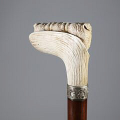 Carved Three Dogs Heads Immerging from a Leaf Grip Cane, 19th Century