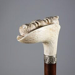Carved Three Dogs Heads Immerging from a Leaf Grip Cane, 19th Century