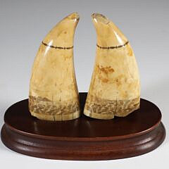 Fine Pair of Scrimshaw Whale Teeth Engraved with Whaling Scenes, 19th Century