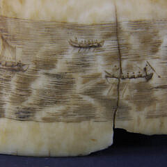 Fine Pair of Scrimshaw Whale Teeth Engraved with Whaling Scenes, 19th Century