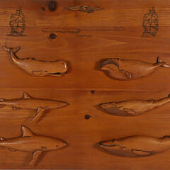J.Harrop Signed Carved Wood Plaque Depicting Four Whales and Two Shark Half-Bodies Mounted to a Panel