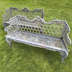 Pair of English Cast Iron "Capron" Garden Settees, 19th Century