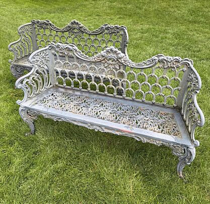 Pair of English Cast Iron "Capron" Garden Settees, 19th Century