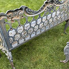 Pair of English Cast Iron “Capron” Garden Settees, 19th Century