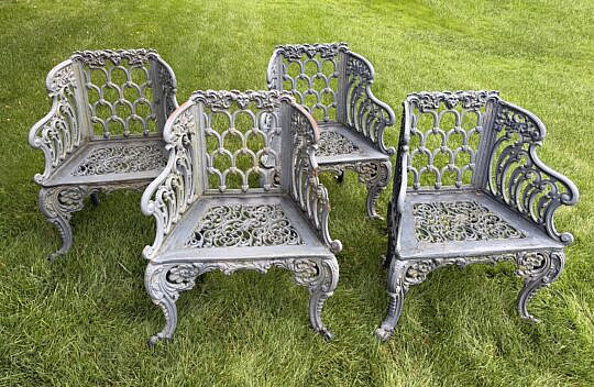 Set of Four English Cast Iron "Capron" Garden Arm Chairs, 19th Century