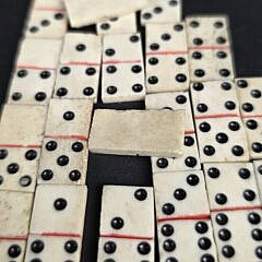 Complete Set of Sailor Made Miniature Antique Whalebone Dominoes, 19th Century