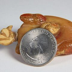 Carved Amber “Huasheng” Snuff Bottle, Qing Dynasty