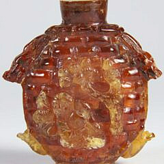 Carved Amber "Hotei and Shoulao" Snuff Bottle, Qing Dynasty