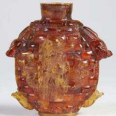 Carved Amber “Hotei and Shoulao” Snuff Bottle, Qing Dynasty