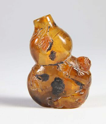 Carved Amber "Calabash and Boy" Snuff Bottle, Qing Dynasty
