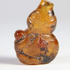 Carved Amber “Calabash and Boy” Snuff Bottle, Qing Dynasty