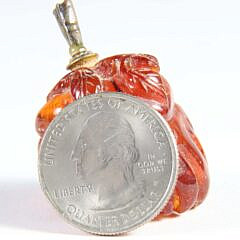 Carved Amber “Buddha’s Hand Citron” Snuff Bottle, Qing Dynasty