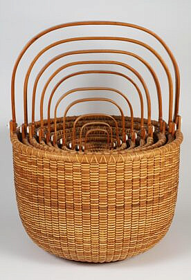 Nest of 10 Ainsley D. Rockwood Round Swing Handle Nantucket Baskets