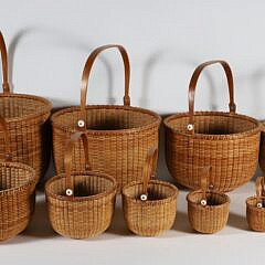 Nest of 10 Ainsley D. Rockwood Round Swing Handle Nantucket Baskets
