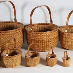 Nest of 10 Ainsley D. Rockwood Round Swing Handle Nantucket Baskets