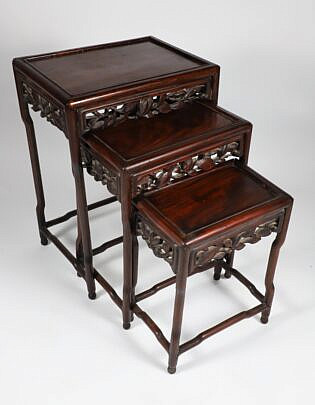 Nesting Set of Three Carved Mahogany End Tables