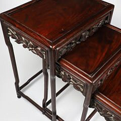 Nesting Set of Three Carved Mahogany End Tables