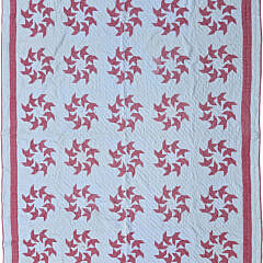 Red and White Calico “Ring of Flying Geese” Patchwork Quilt, circa 1930s
