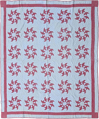 Red and White Calico "Ring of Flying Geese" Patchwork Quilt, circa 1930s