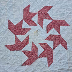 American Red and White Calico “Ring of Flying Geese” Patchwork Quilt, circa 1930s