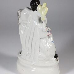 Staffordshire Figural of a King Charles Spaniel and Woman and Bird