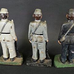 Three Cast Iron Figural Soldiers Doorstops, 20th century