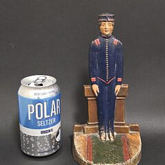 Scarce Antique Painted Cast Iron Figural Bellhop Valet Doorstop, circa 1920s