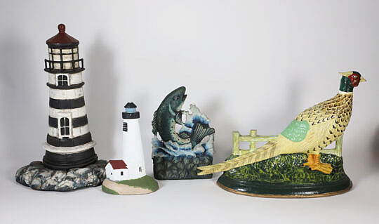 Four Cast Iron Doorstops: 2 Lighthouses, Pheasant, and Fish