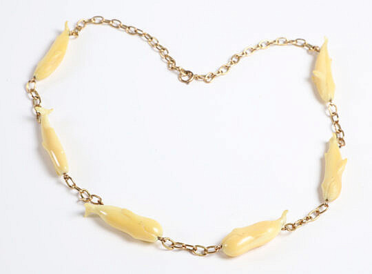 Charlie Sayle Sr. (1908-1994) Six Carved Whales Necklace on Gold Chain