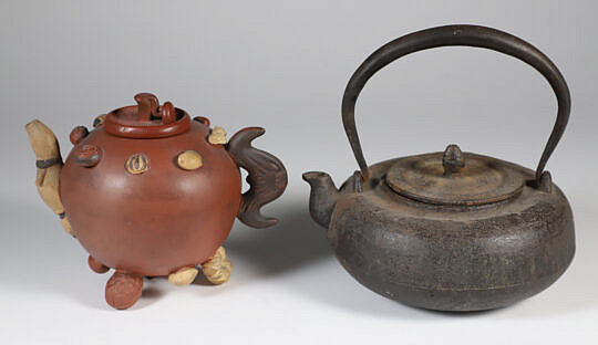 Two Japanese Teapots Comprising a Ceramic and Cast Iron